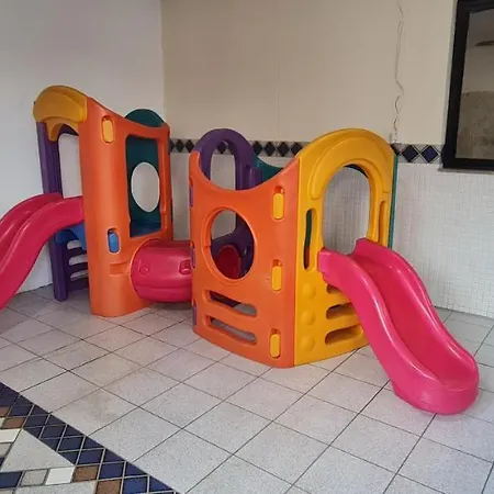 Apto Aconchegante: Beachfront Comfort with BBQ & Daily Cleaning Guaruja Exterior photo